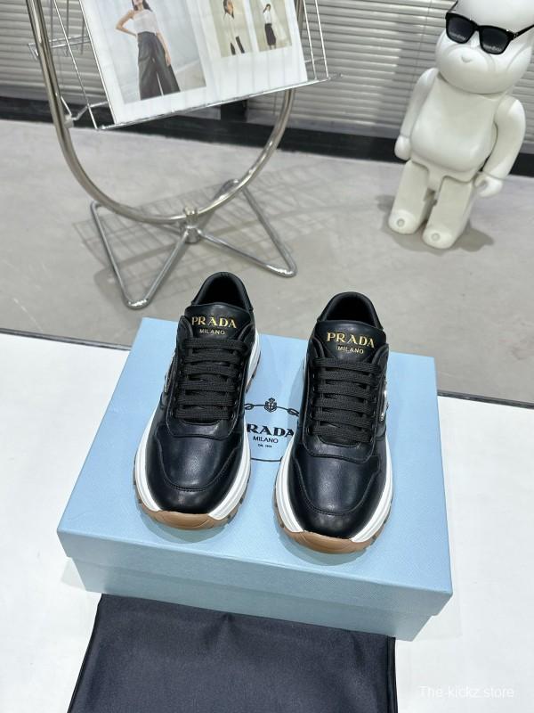 2025 Unisex Prada Black Calf Leather Sneakers KFY00310